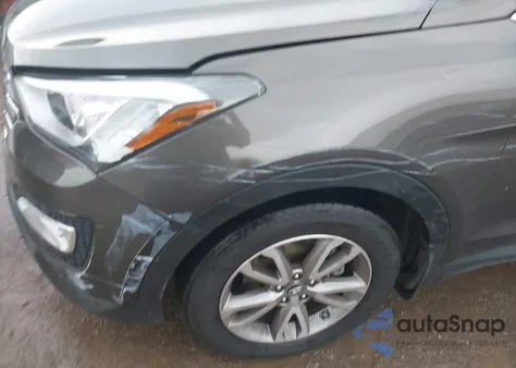 2014 Hyundai Santa Fe Sport 2.0L Turbo z USA, uszkodzony, nr VIN 5XYZUDLA7EG129359